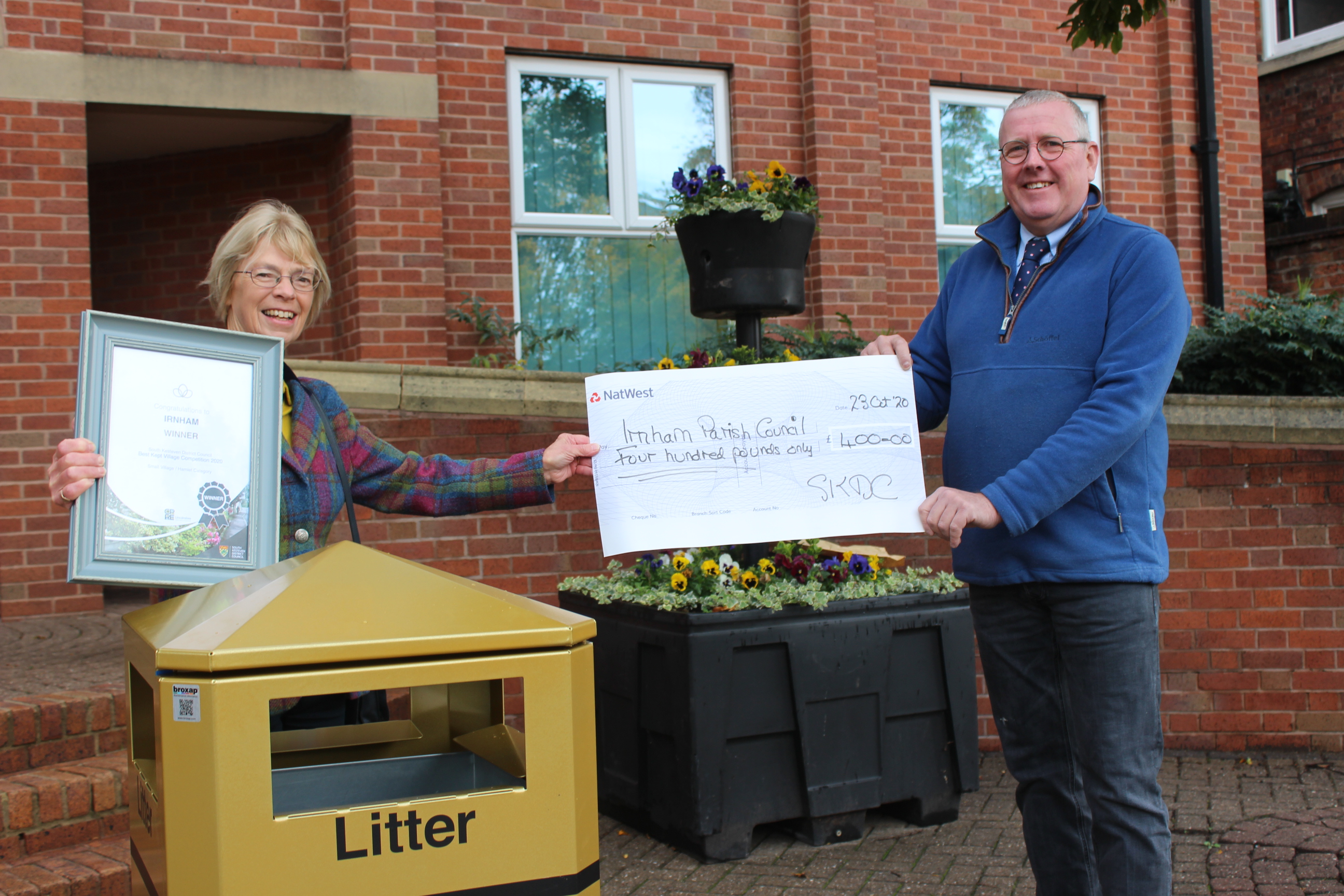 Receiving cheque for Irnham parish