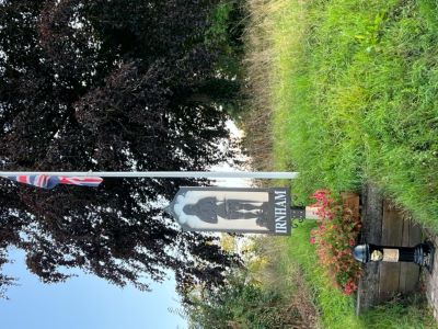 Flag Pole and Village Sign