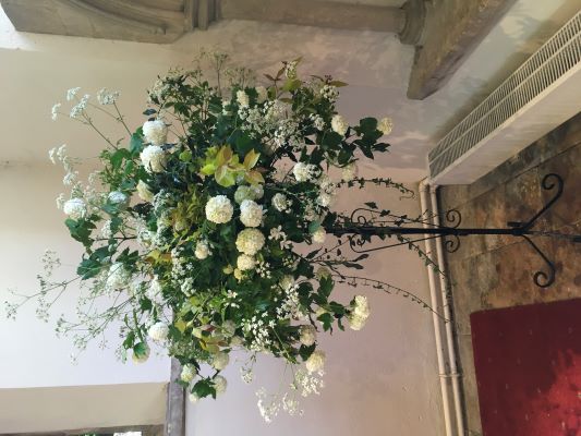 flowers on pedestal