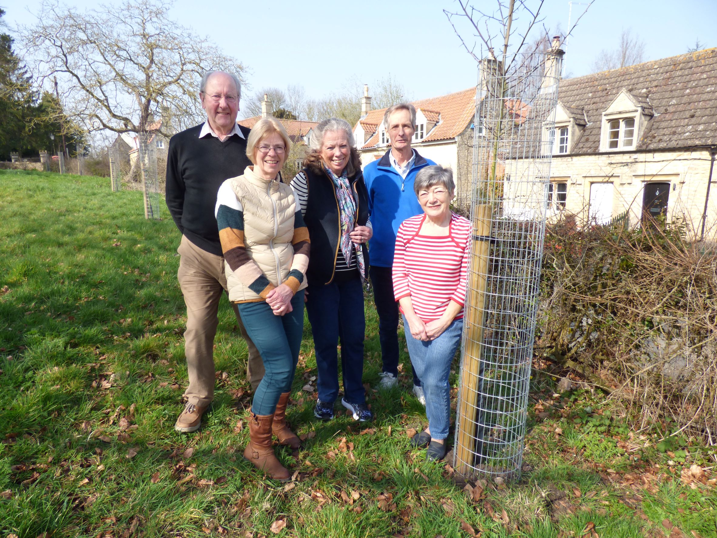 Councillors around newly planted tree